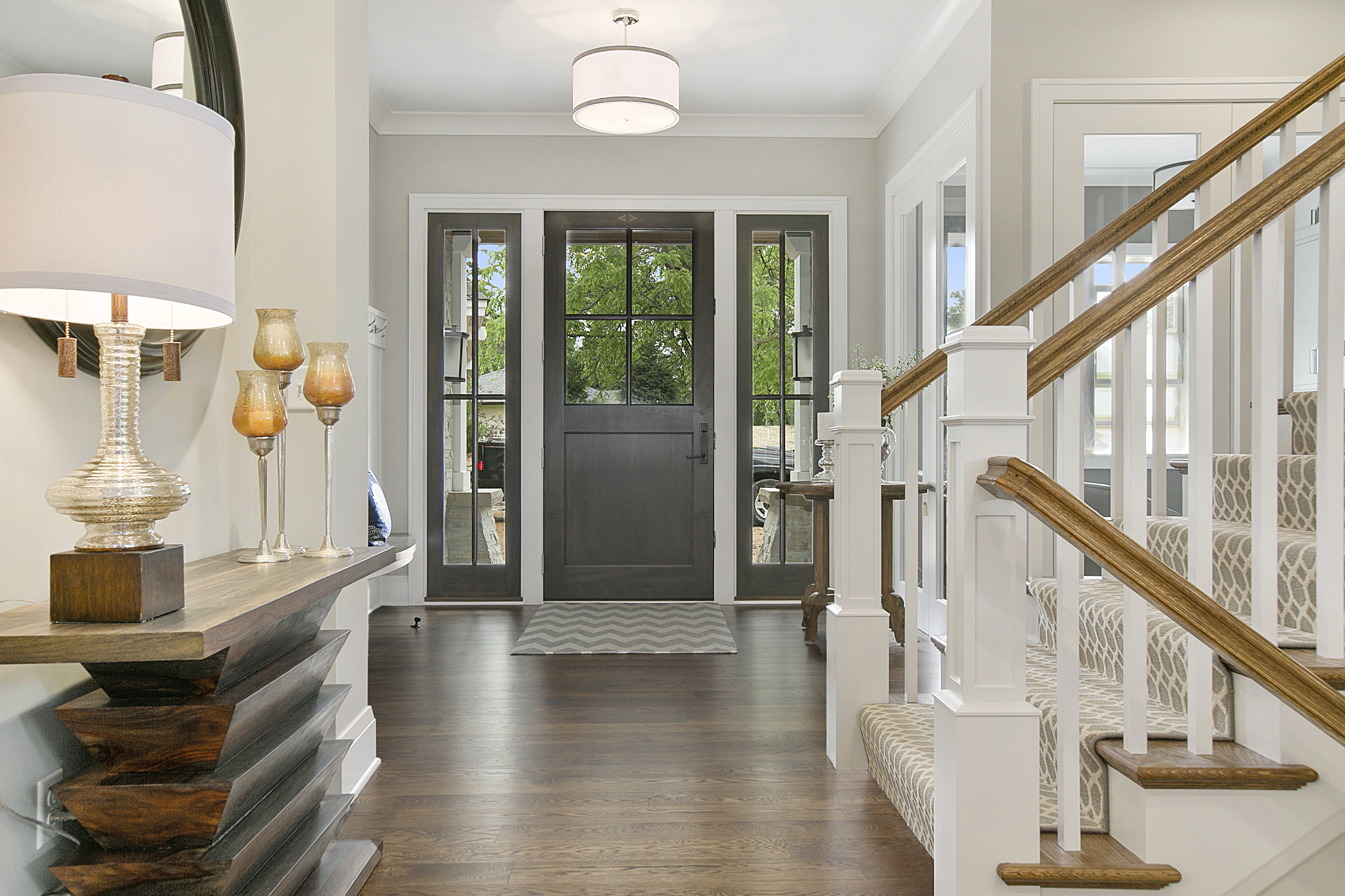 Foyer interior painting with light grey walls and trim