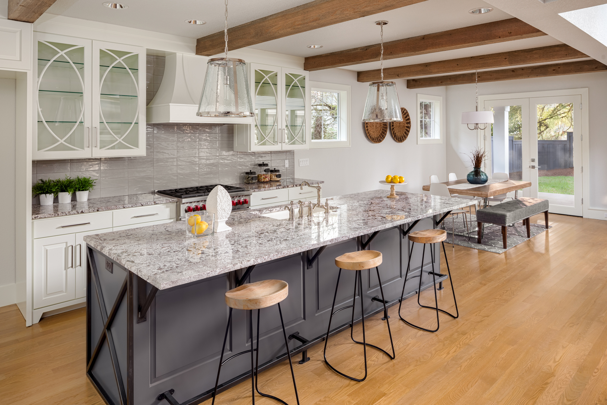 Professional cabinet painting kitchen transformation with grey island.