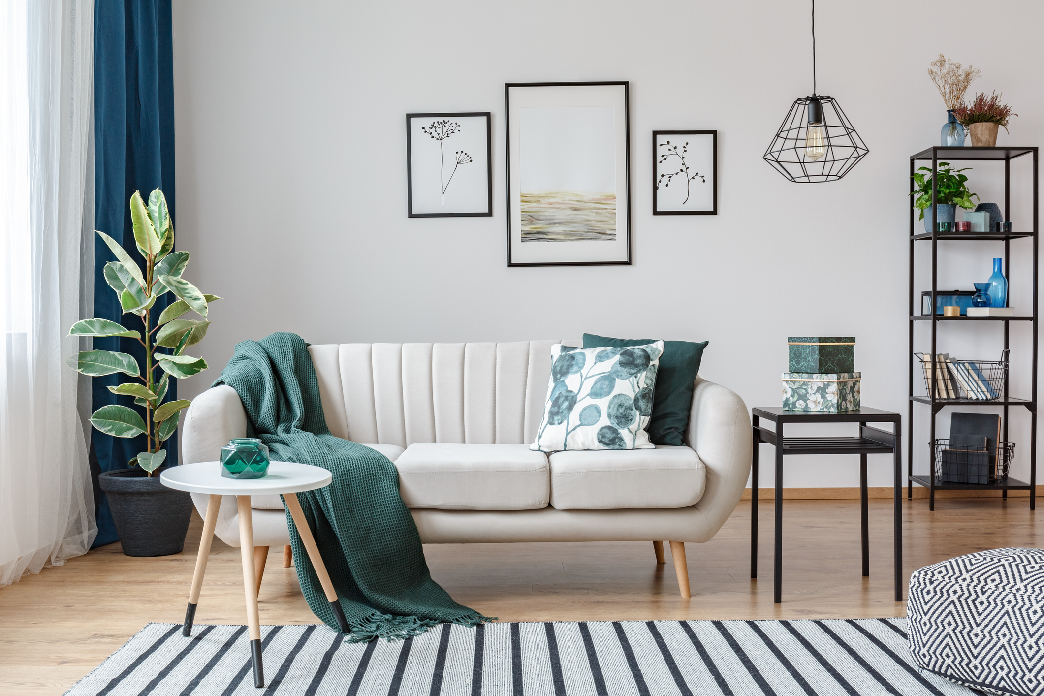 Bright modern living room interior painted in clean off-white tone.